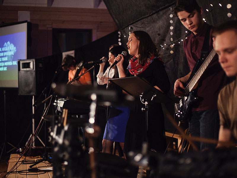 School of worship people playing instruments