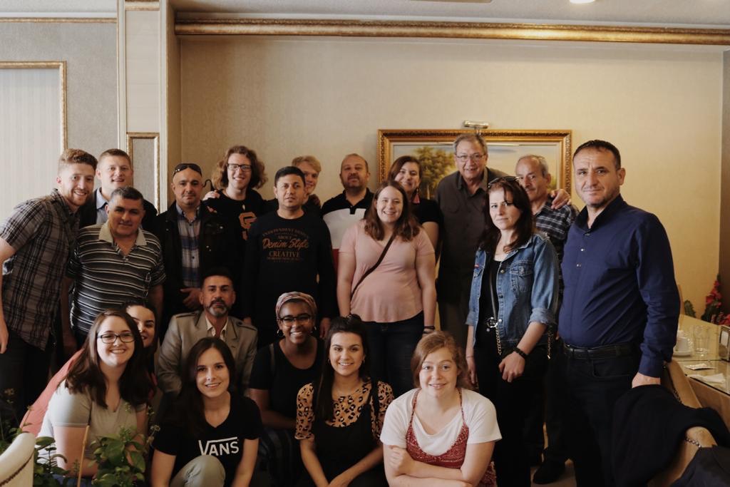 NCU students and professor with refugee families in Turkey