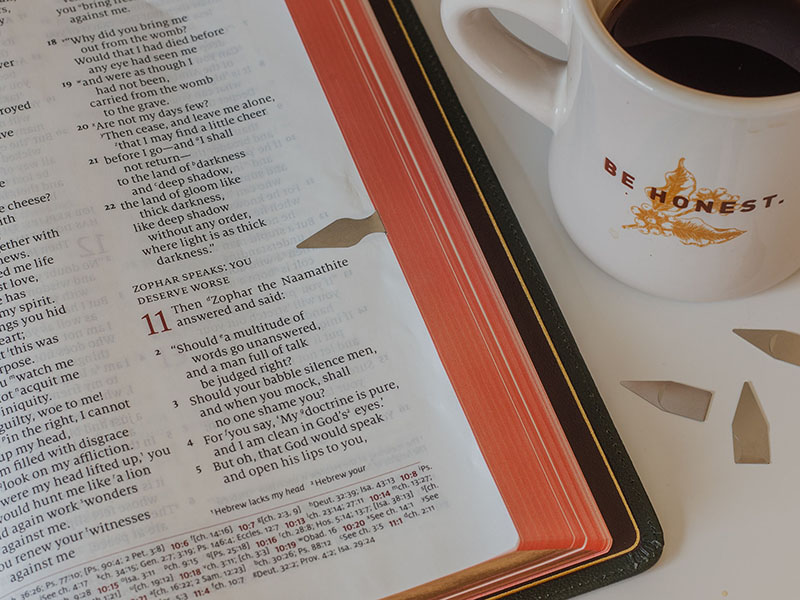 Open Bible with cup of coffee