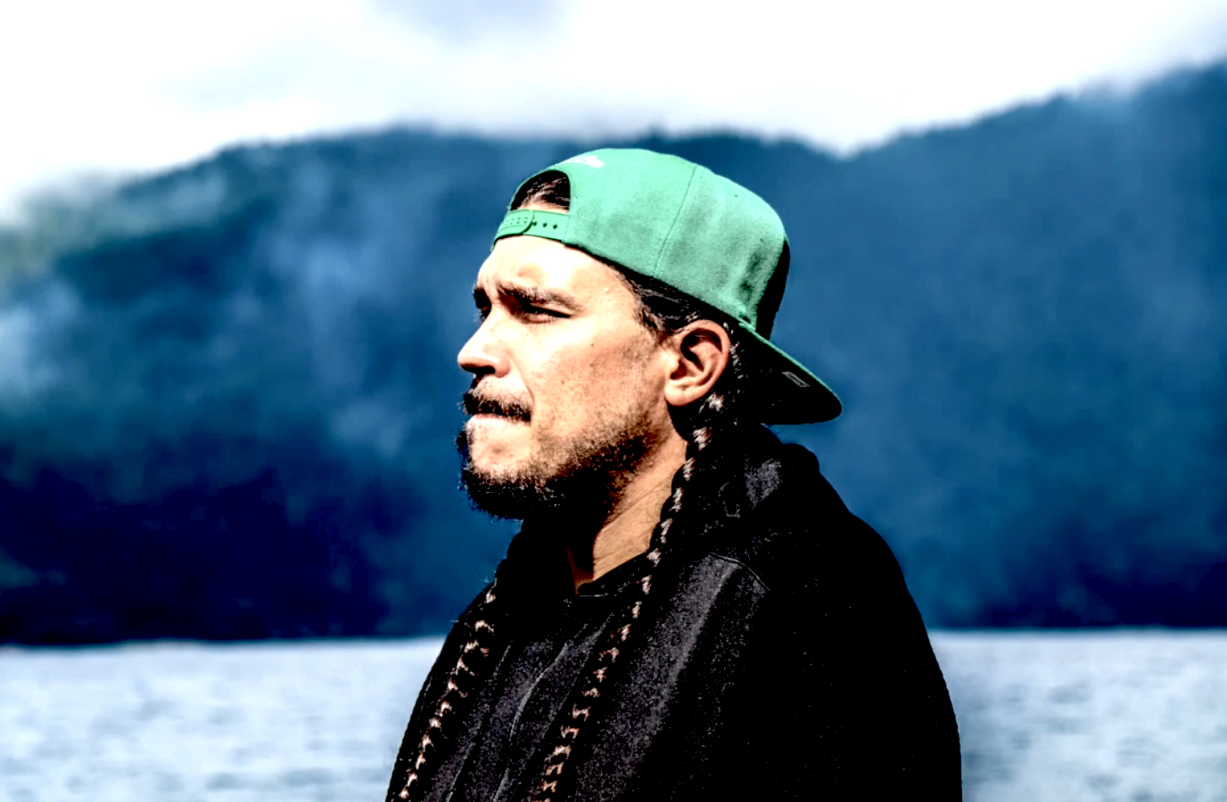 T.J. Valtierra stands by a lake. Credit: YouTube video, Tamarack Dreams by Dan and Sandy Adler