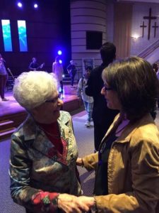 Martha Tennison and Juldy Pruitt greet each other after an NCU chapel service