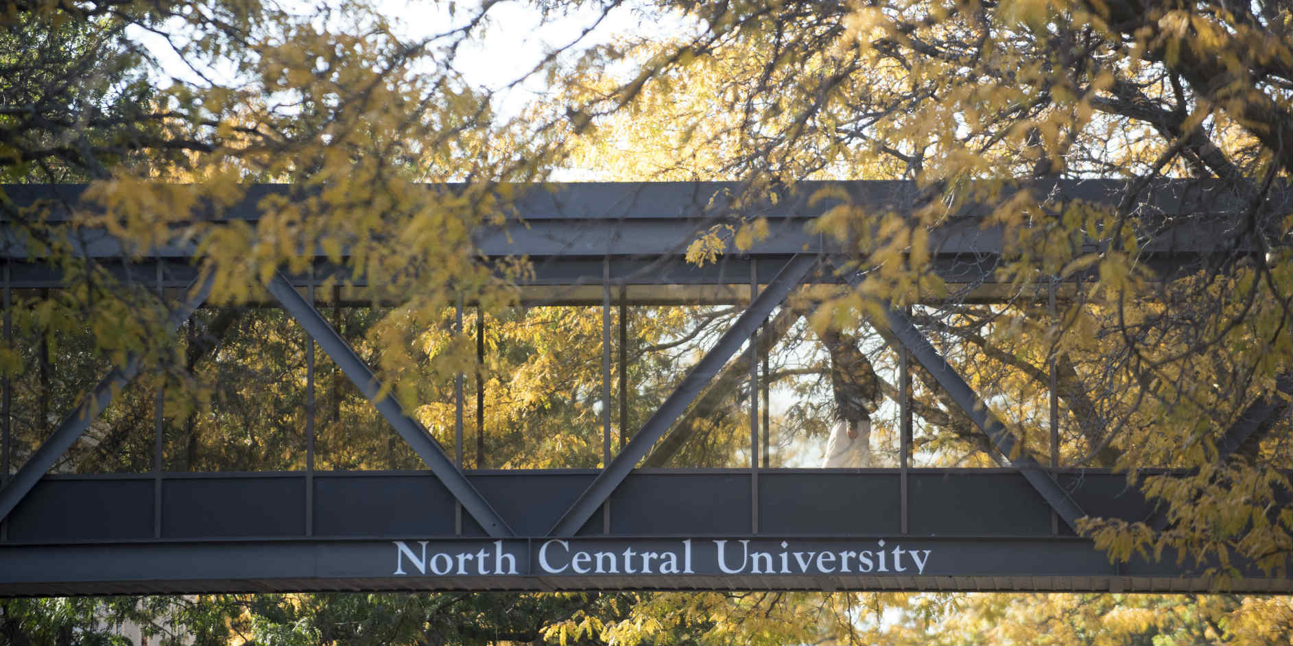 A North Central University student uses the skyway.