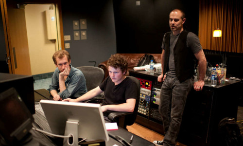 A professor works with students in McPherson Studios.