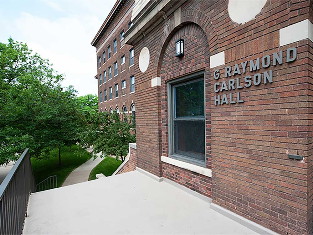 The outside entrance of Carlson Hall