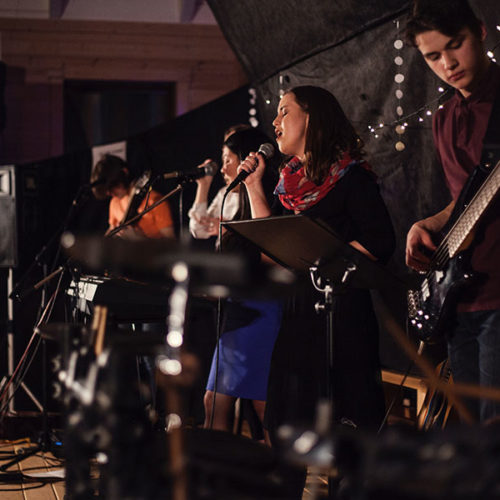School of worship people playing instruments