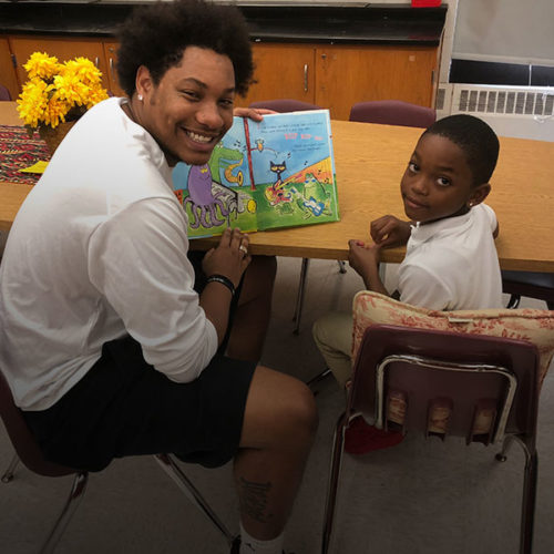 North Central athletes help elementary school students read