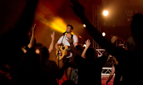 NCU guitar player at chapel