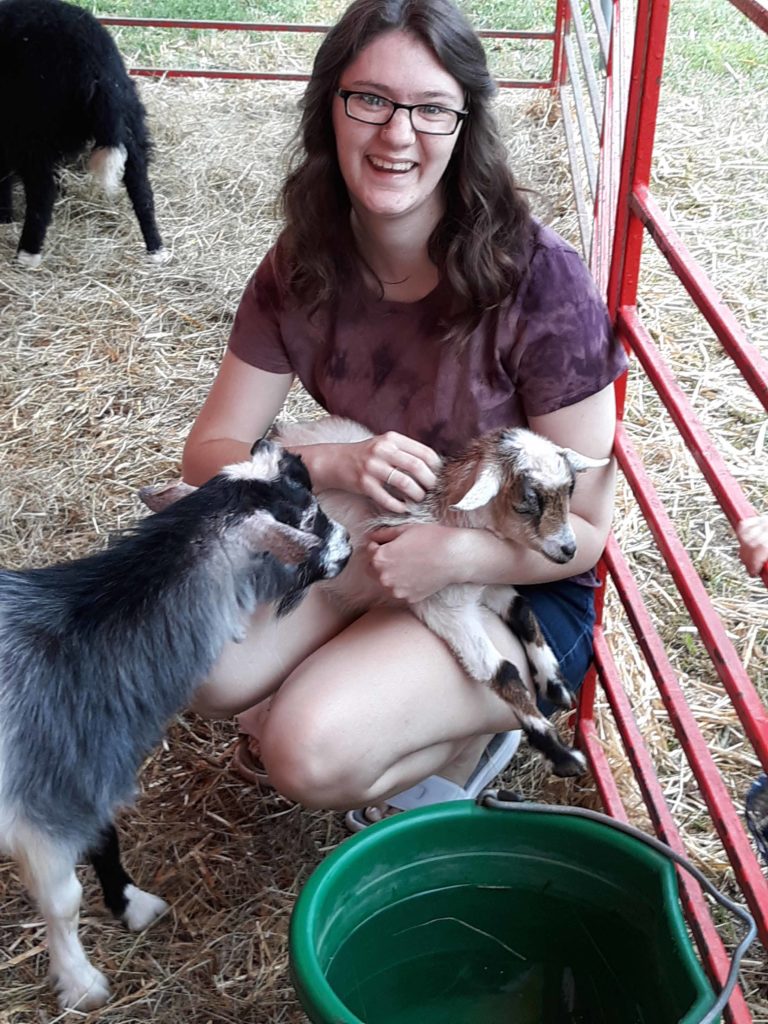 Tennison with goats