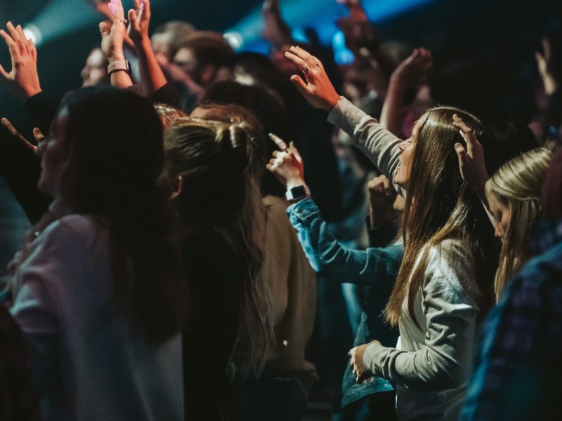 People worshipping in church