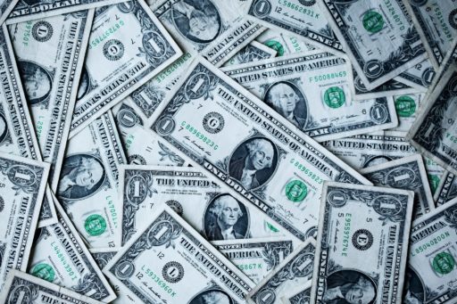 one dollar bills laid out