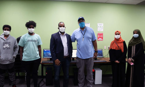 Professor Colin Miller with community members
