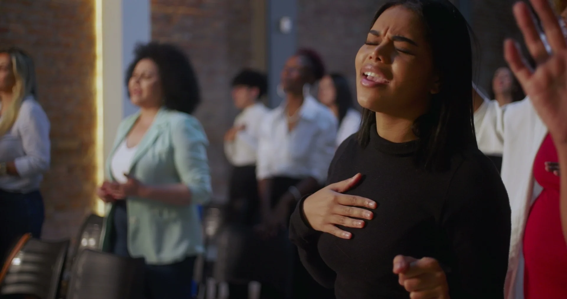 Students worshiping and serving during a church gathering or community event