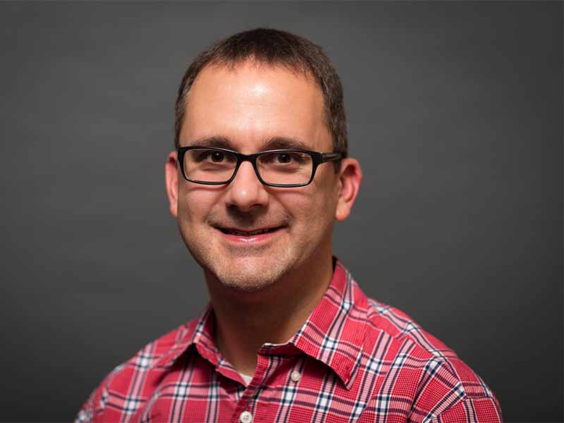 Chris Woelfle named NCU's Employee of the Year